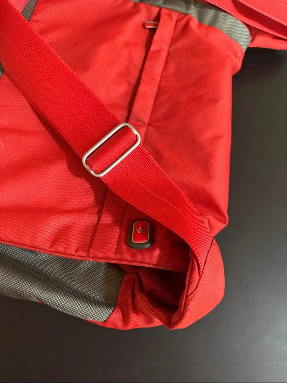 Tumi Red Messenger Bag with Gray Accent. Expandable. Laptop section.